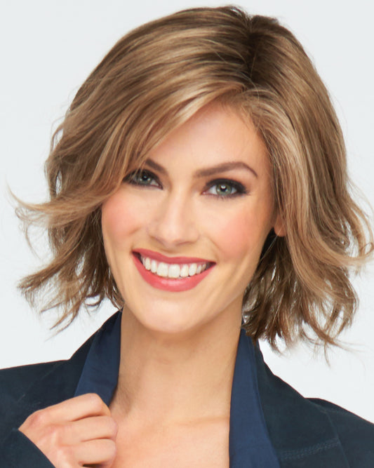 Ahead of the Curve wig by Raquel Welch.  Collar length beach wave bob with lace front and mono part.  Synthetic hair
